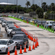 Cars line up for coronavirus testing site at Hard Rock Stadium in Miami Gardens near Miami, on August 5, 2020.